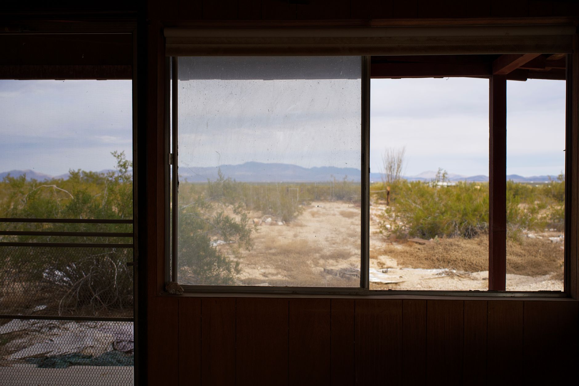a view of the desert from inside a house